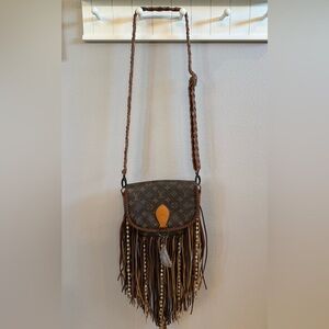 Vintage boho Brown Fringe Crossbody Bag. World traveler
